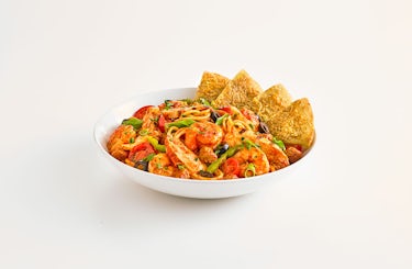 Photo of Jambalaya pasta with handmade bread.