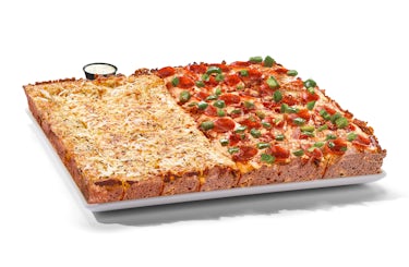 half cheesy bread half cyo three topping squarefooter with pepperoni, green peppers and extra cheese.